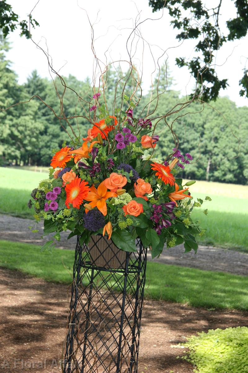 CF0508-Orange and Purple Outdoor Ceremony Wedding Arrangement