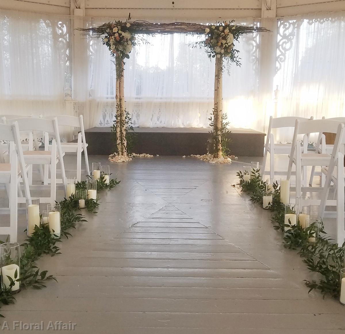 CF09288-Rustic Wedding Ceremony With Greenery and Candles Down Aisle